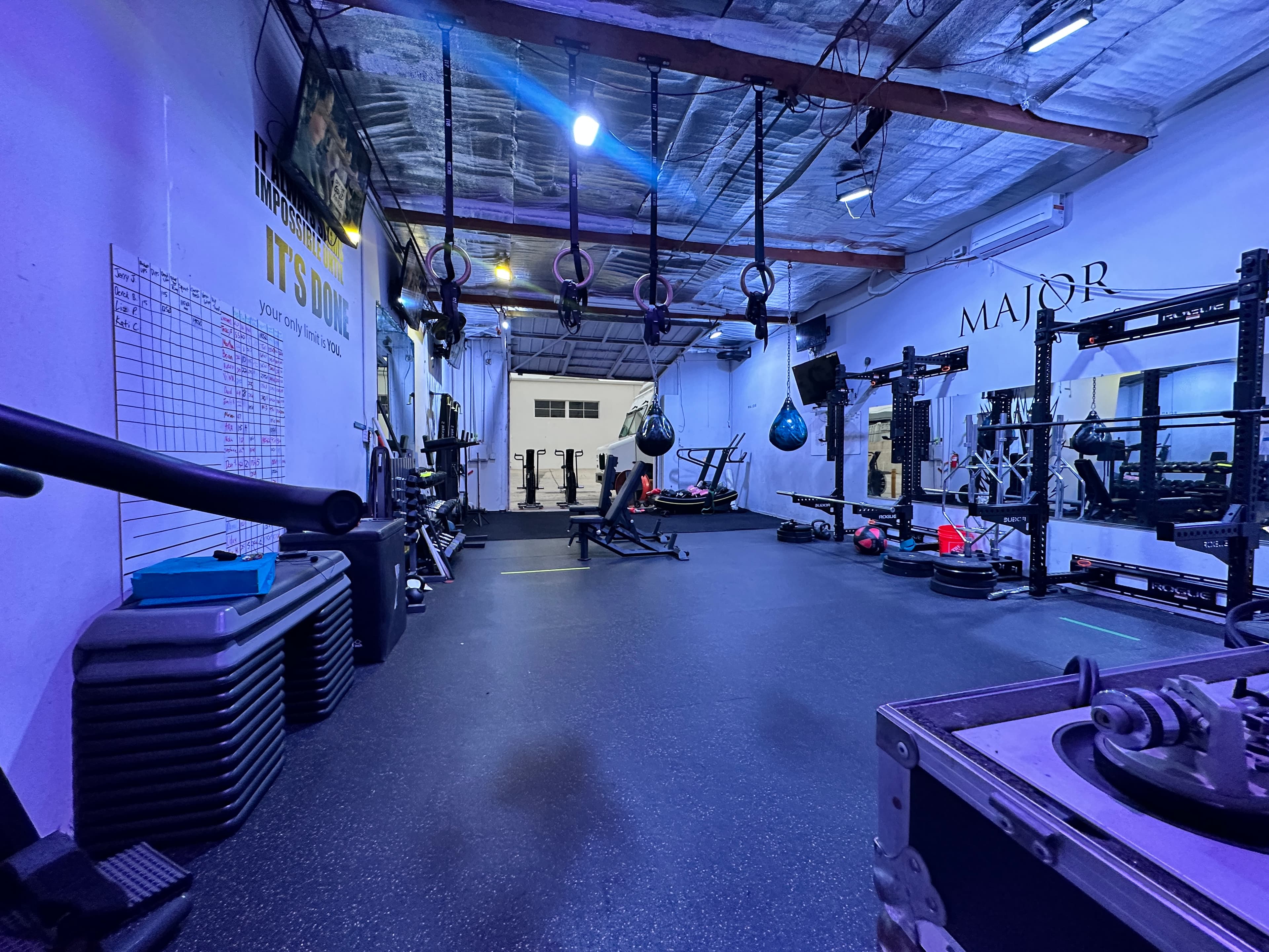 Off The Grid Fit gym interior in Santa Ana, CA — strength training space with personal training equipment.