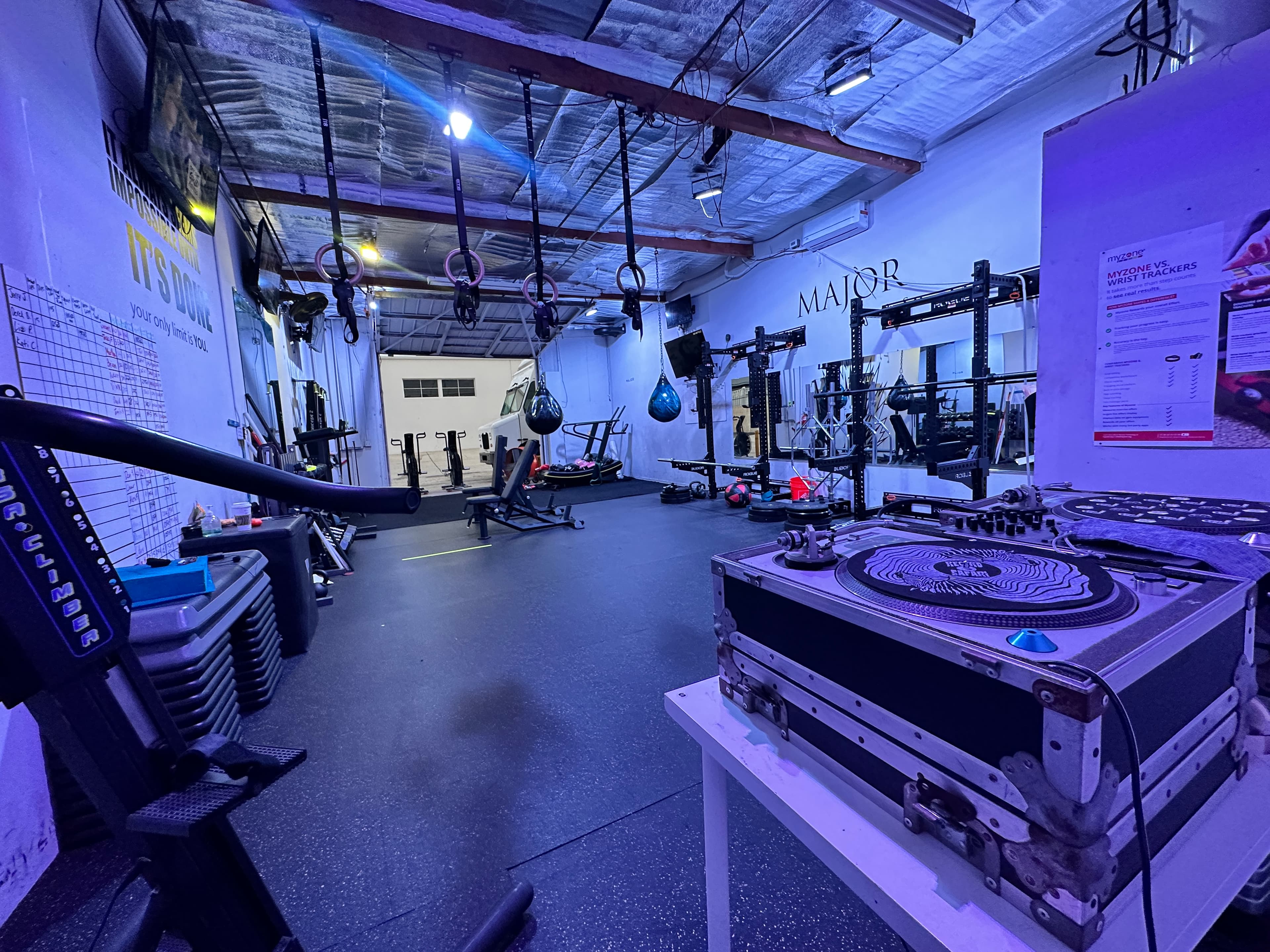 Off The Grid Fit studio in Santa Ana, CA — gym interior wide shot.