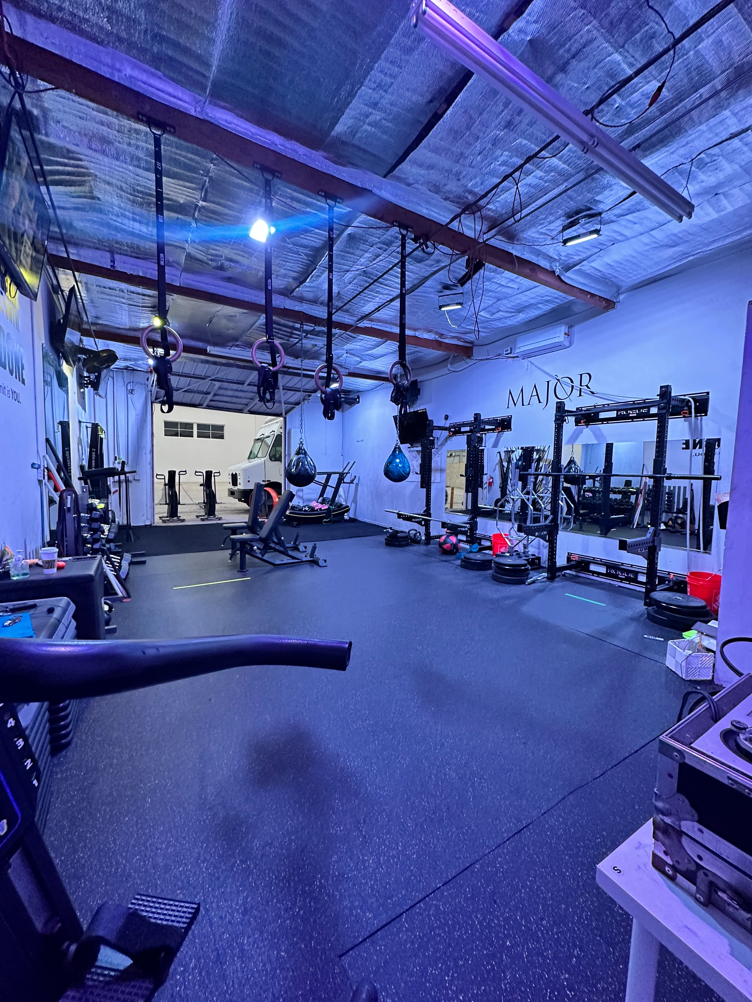Off The Grid Fit studio in Santa Ana, CA — training floor and racks.
